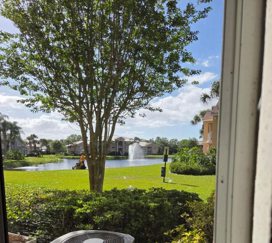 Another great deal at The Club!  Corner unit, ground floor with pond view from every room including covered patio. Tile flooring, granite counters in kitchen and bath. SS appliances. .  **Subject to lease until January 2027. Tenant pays $1685/month. ** The Club is a gated community offering beautiful garden style condos, centrally located between I-95 and the turnpike.  It has a Clubhouse with a business center, a library, a large pool, tennis courts/pickleball courts, a playground and a BBQ area.   New roof in 2025 and currently undergoing exterior painting enhancing property appearance and value.