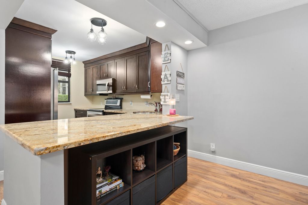 Photo of 8421 Forest Hills Drive #106, Coral Springs, FL 33065 (MLS # B26010677)