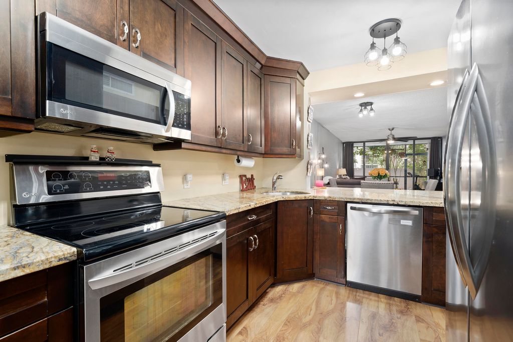 Photo of 8421 Forest Hills Drive #106, Coral Springs, FL 33065 (MLS # B26010677)