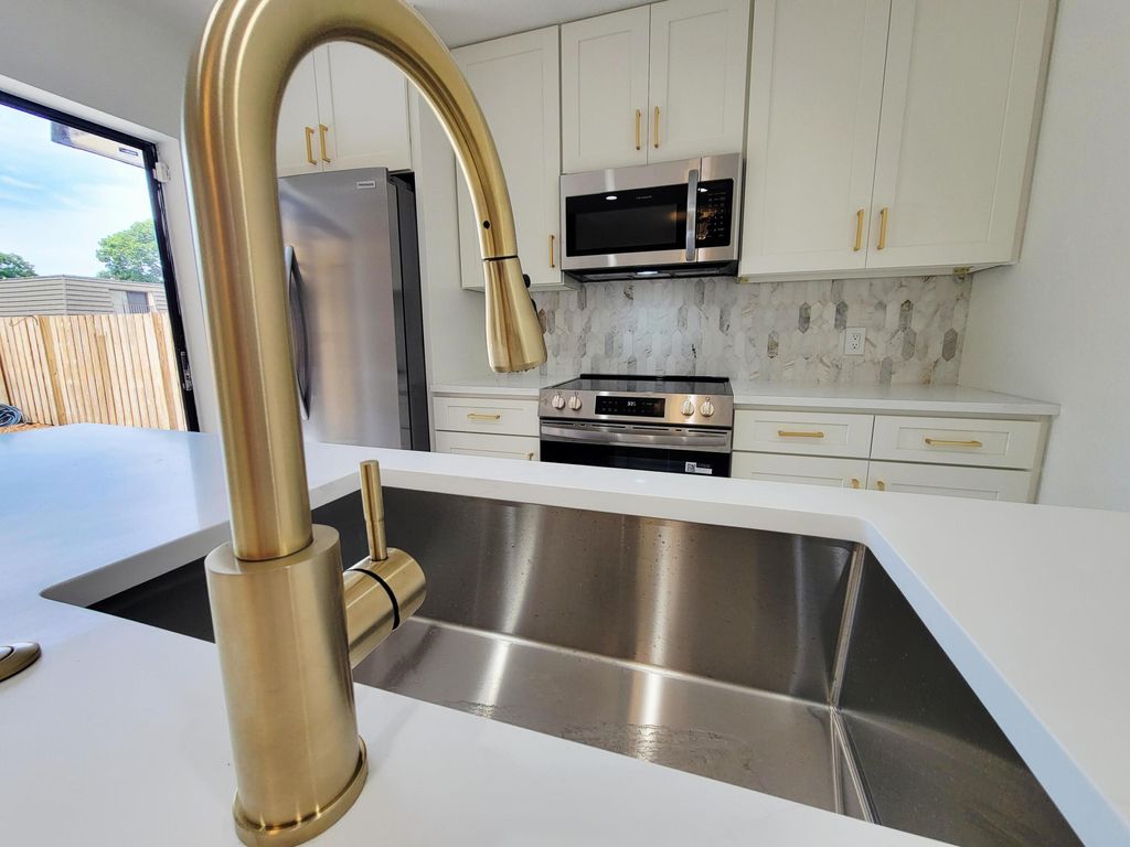 Photo of 712 7th Way, West Palm Beach, FL 33407 (MLS # B26042962)