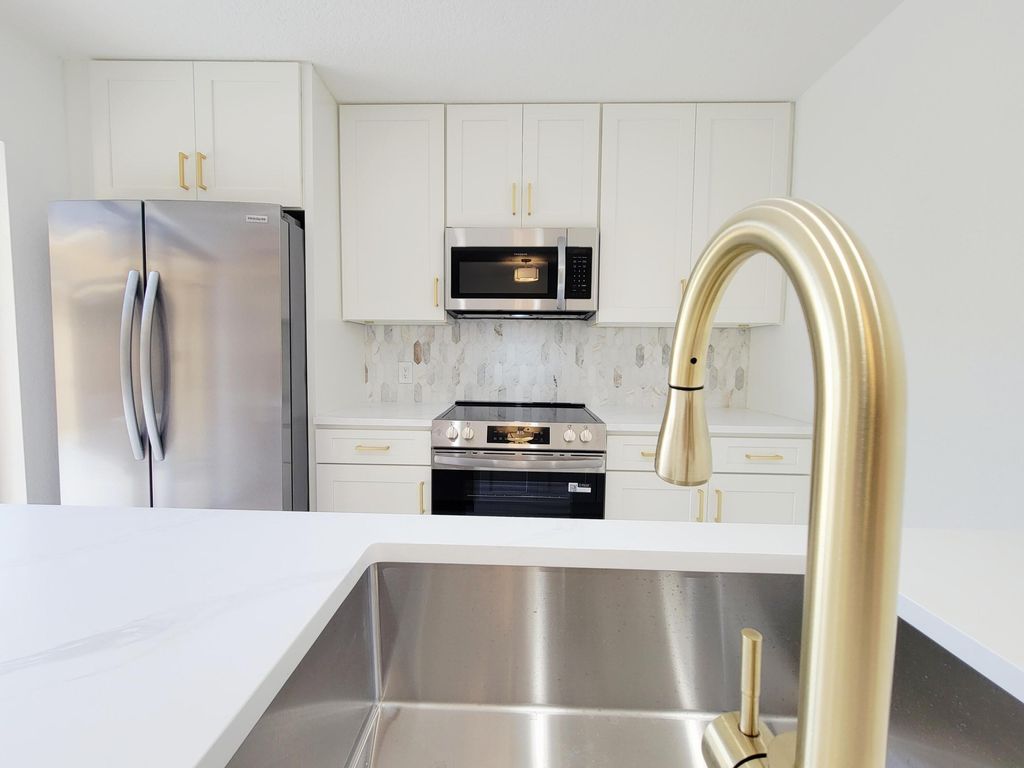Photo of 712 7th Way, West Palm Beach, FL 33407 (MLS # B26042962)