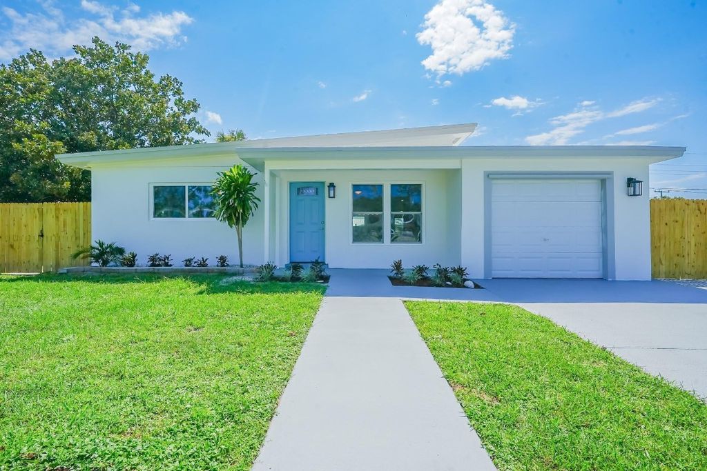 Photo of 124 E Arbor Avenue, Port Saint Lucie, FL 34952 (MLS # F10457761)