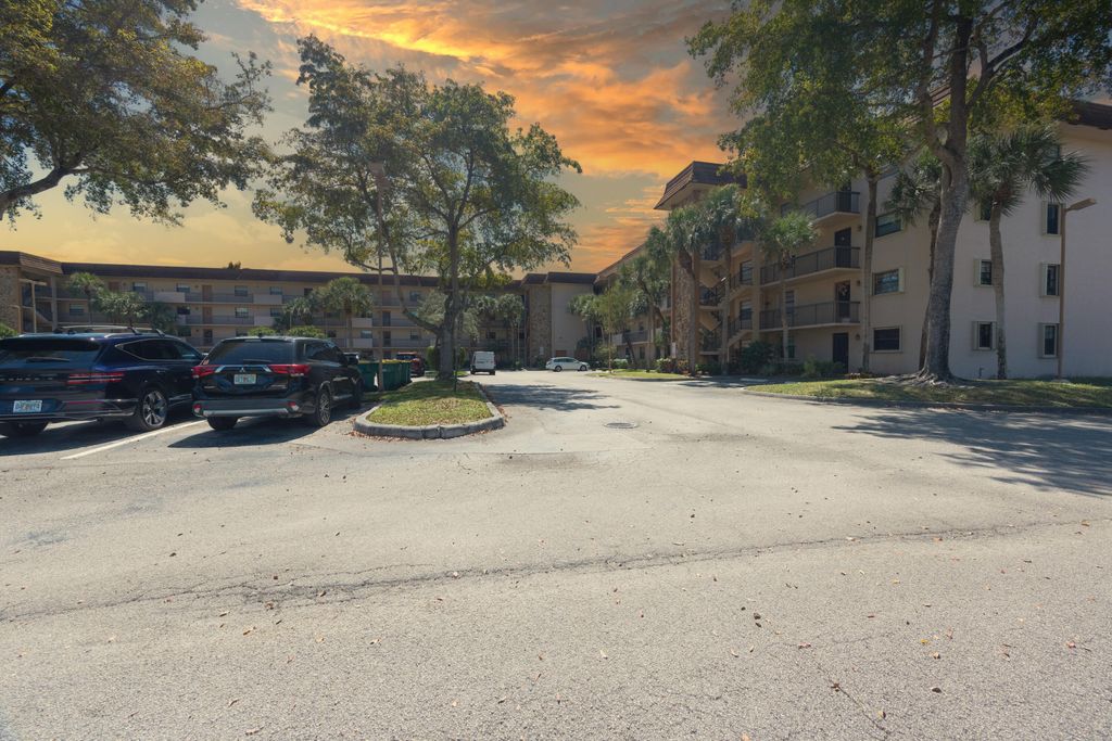 Photo of 4940 E Sabal Palm Boulevard #108, Tamarac, FL 33319 (MLS # B26001527)