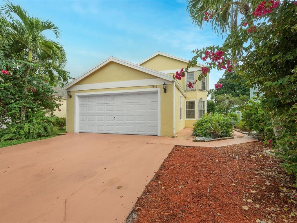 Charming and spacious single family home with 3 bedrooms, 2.5 bathrooms and 2 car garage. Master bedroom is located downstairs along with the laundry room. Property has accordion shutters upstairs and panels downstairs. Victoria Woods is a beautiful manned gated community with pool, playground, lots of trees, BBQ area, tennis court, sand volleyball and extra storage where you can park your boats and RVs for $300 annually. HOA is only $115.00. Don't miss this opportunity.