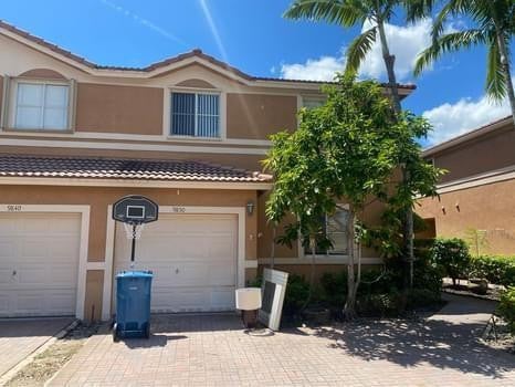 Photo of 9850 NW 24th Street, Sunrise, FL 33322 (MLS # B26078435)
