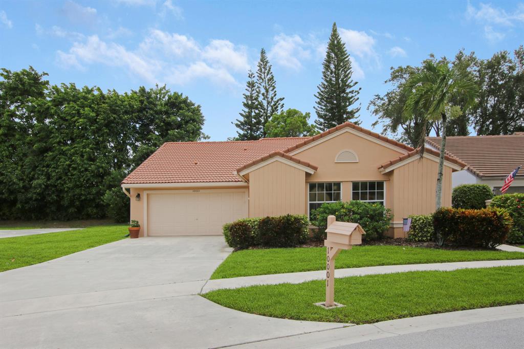 3 bedroom 2 bath home in highly desirable Boca Springs. The home features volume ceilings and an open floor plan with lots of light. The covered screened-in patio opens to a private yard. The large master bedroom features a walk-in closet and dual sinks. The exterior has been freshly painted. There is a two-car garage with an oversized driveway. Low HOA, shutters, and a 3-zone sprinkler system. It is a short walk to the community recreational facility, including a pool, playground, tennis courts, basketball, and volleyball courts.