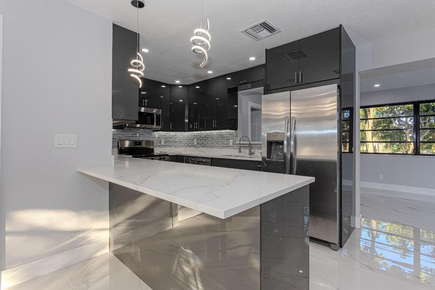 Beautiful Single-family home with 3 bedrooms and 2 bathrooms in Palm Springs, Florida, fully remodeled with over 1,300 sqft of living space. Modern design with open kitchen, new cabinetry, countertops, and stainless-steel appliances. Updated bathrooms with contemporary finishes. New flooring, LED lighting, and functional layout. Features a spacious private backyard with no direct neighbors. Move-in ready, ideal for personal use or investment. Seller will contribute with $5000.