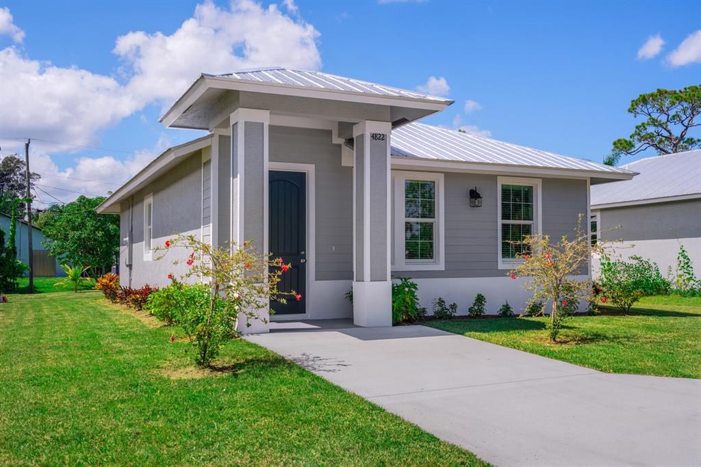 Photo of 4822 SE Flounder Avenue, Stuart, FL 34997 (MLS # R10750401)