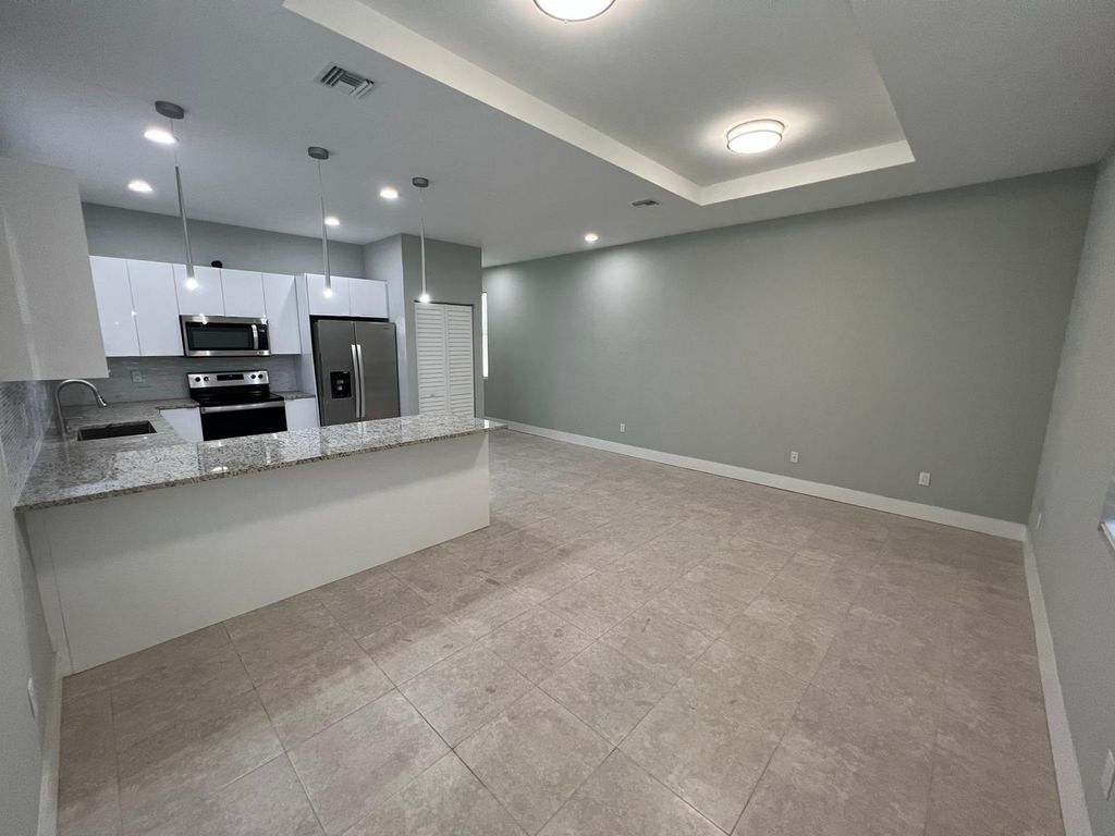 Photo of 225 N E Street, Lake Worth Beach, FL 33460 (MLS # R10966614)