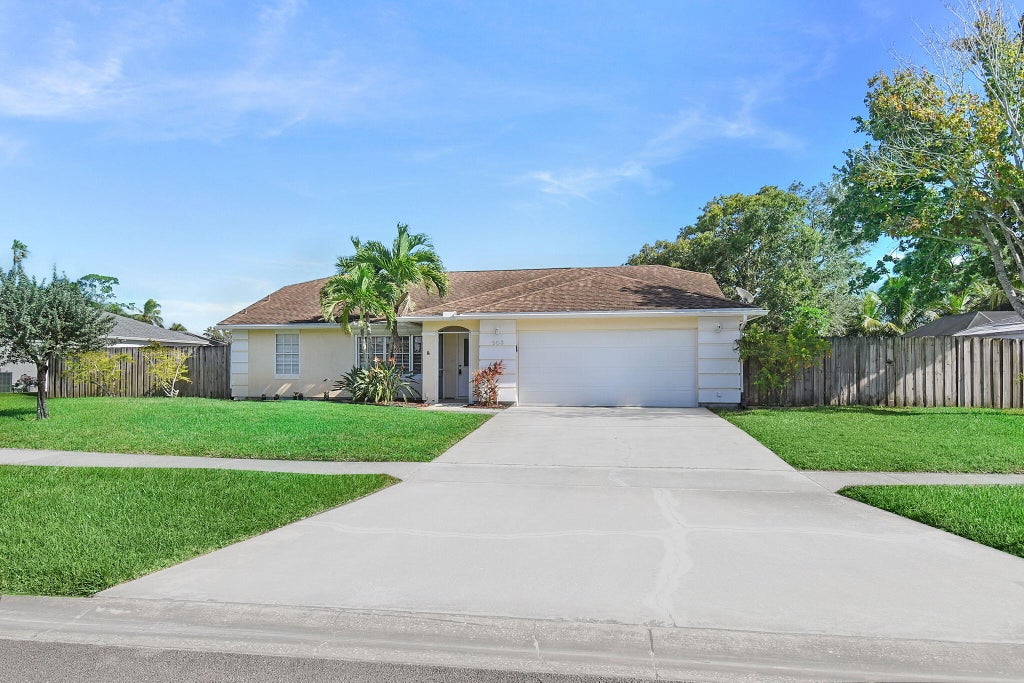 Photo of 503 NE Solida Circle, Port Saint Lucie, FL 34983 (MLS # R11133387)