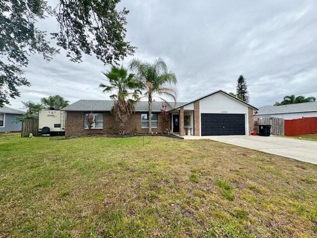 Photo of 2302 SE Shipping Road, Port Saint Lucie, FL 34952 (MLS # R11090052)