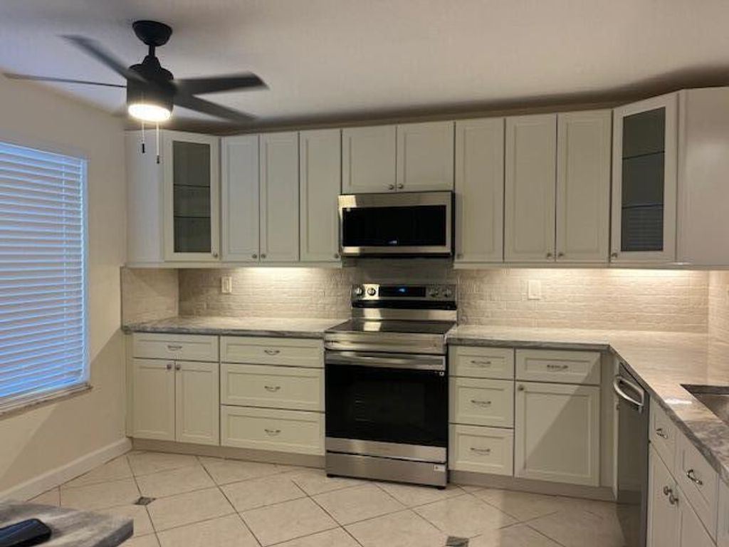 Photo of 5600 Fairway Park Drive #103, Boynton Beach, FL 33437 (MLS # R11134245)