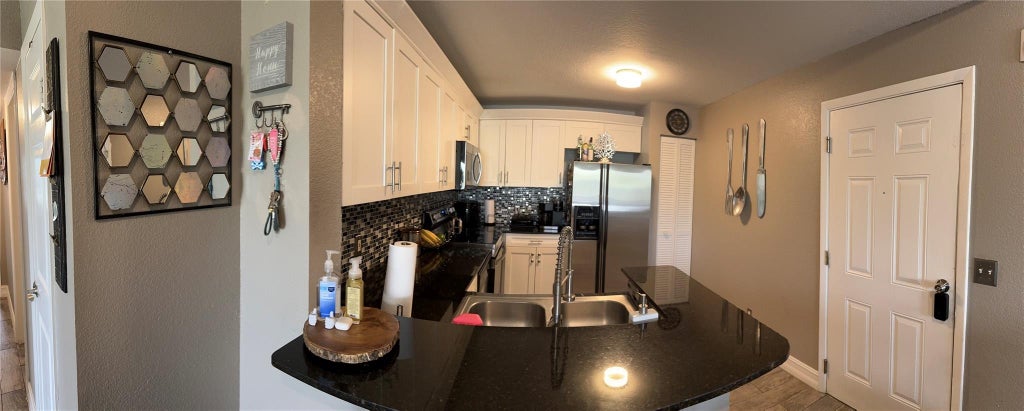 Photo of 1705 Palm Cove Boulevard #307, Delray Beach, FL 33445 (MLS # F10459696)