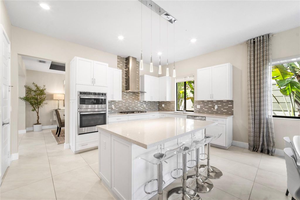 Photo of 10445 Cobalt Ct, Parkland, FL 33076 (MLS # F10556383)