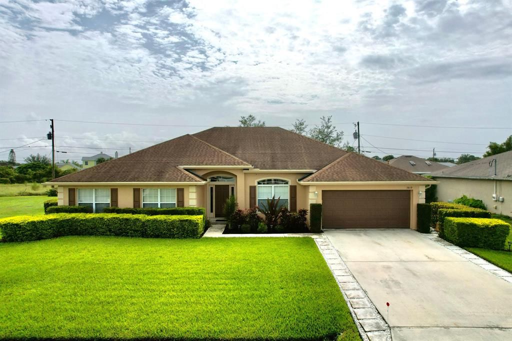 Photo of 3819 SW Kasin Street, Port Saint Lucie, FL 34953 (MLS # R10747457)