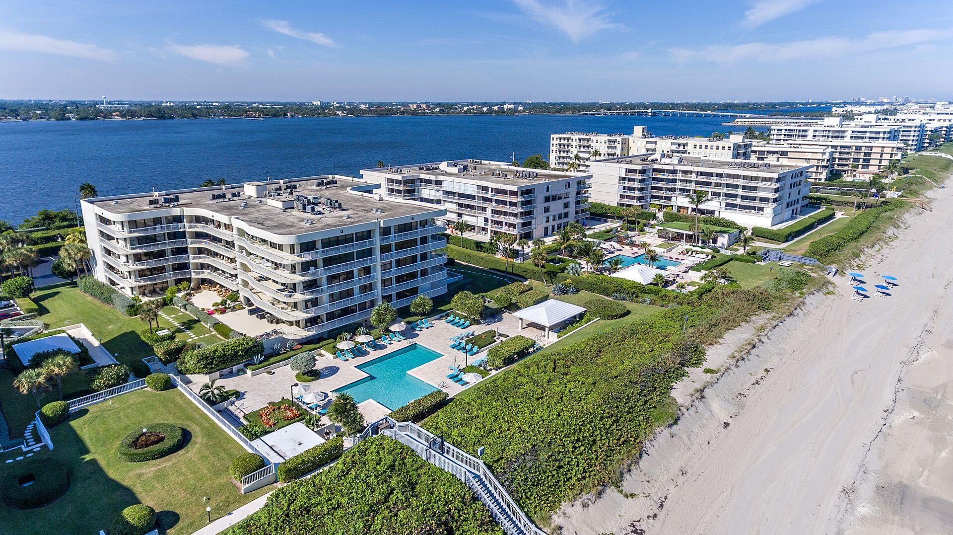 Situated directly on the Atlantic Ocean with miles and miles of sandy beach, the Meridian is one of the premier buildings in Palm Beach. View spectacular sunsets and your direct Intracoastal view throughout the living room and both bedrooms. Linger over your favorite beverage on the spacious porch which stretches across the entire unit. Beautifully renovated with magnificent open kitchen - perfect for entertaining, stunning primary bath, impact windows/doors, electric shades, washer & dryer, fully furnished and ready to be enjoyed. Tennis, pickleball, gym and resort-style pool. 24 hour staffed gate and enclosed garage parking.