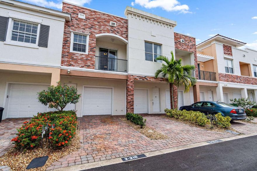 Brand New Birch HardWood Flooring, Whole Home Fresh Paint. Brand New Stainless Steel Refrigerator and Stove. New carpet on stairs. AC Just Installed in 2020. Balcony off master bedroom and a second balcony off of living room. His and hers master bedroom closets and large closet in second bedroom as well. Travertine Marble in Bathrooms and Kitchen. Granite Countertops, Crown Molding, Mirrored Landing and so much more. Luxury living at it's finest! Come see this one soon, it won't last long! Oversized garage with room for a car and storage! Community pool. Laundry room and walk in pantry. HOA Fee includes cable and internet and grounds maintenance and building insurance.