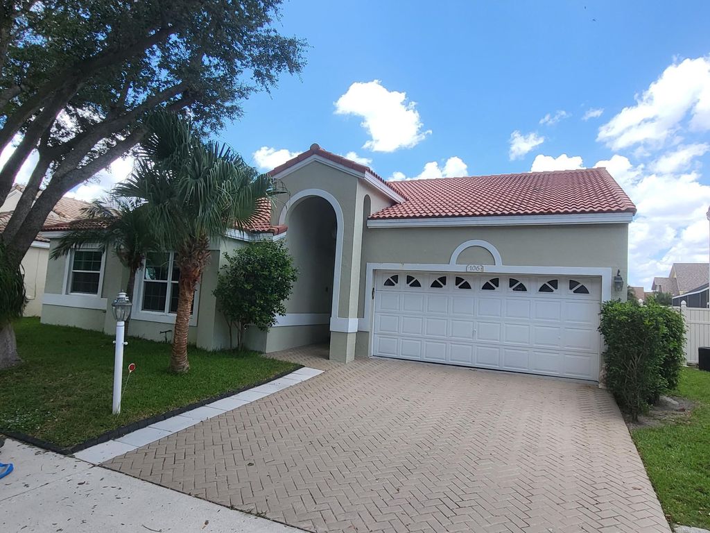 Photo of 106 Siena Oaks Circle W, Palm Beach Gardens, FL 33410 (MLS # R10909024)