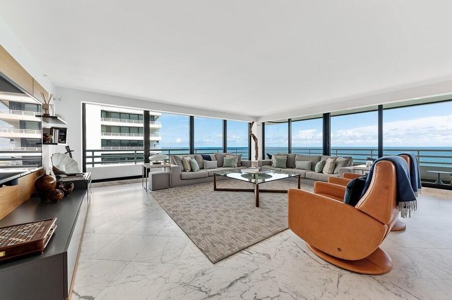 From the moment you enter this residence you're welcomed by breathtaking ocean views.  This rarely available wrap-around corner unit has forever ocean views to the east and city views to the west.  This fabulous unit has it all!  The kitchen has been renovated with sleek two-tone cabinetry, glass backsplash, designer lighting and hardware, wine cooler, upscale appliances and an oversized kitchen island that seats six!  Each bedroom features a luxuriously renovated ensuite bathroom and walk-in closets with built-ins. Marble flooring encompasses the common areas and hardwood flooring in the bedroom suites.  The upgrades are never-ending in this 12th floor masterpiece... from the custom lighting to the marble balcony; this oceanfront oasis has it all.