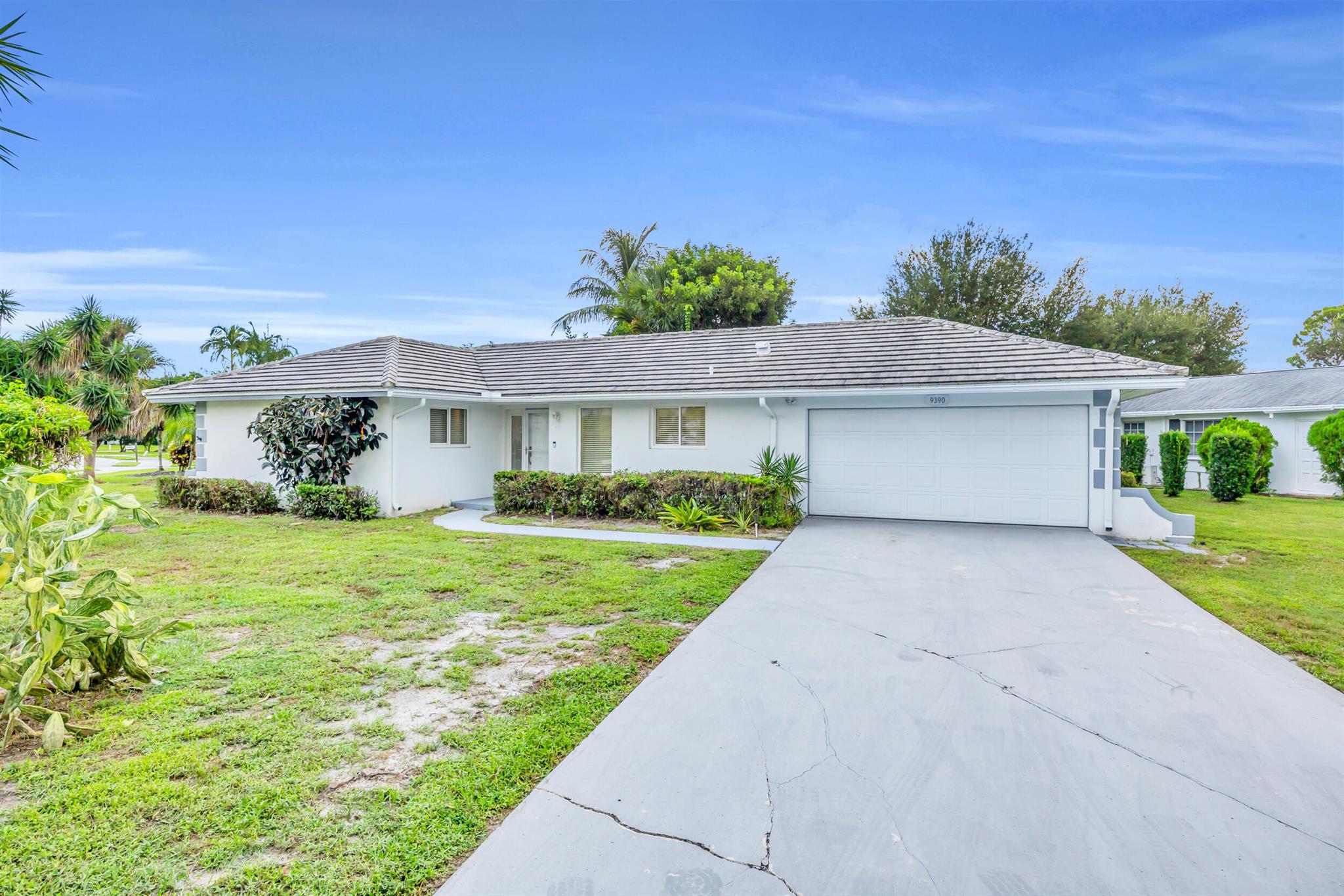 Welcome to this beautifully maintained 2-bedroom, 2-bathroom CBS home nestled on a spacious corner lot in the sought-after 55+ community of Little Club in Tequesta. This home offers a private backyard with serene lake views. Inside you'll find a remodeled kitchen with modern finishes, updated cabinetry, and quality appliances. The home offers a functional layout filled with natural light and spacious bedrooms, including a primary bedroom with an en-suite bathroom. Other upgrades include newer vinyl flooring throughout and hurricane impact windows. Little Club is an active community with an array of amenities available to residents such as: pickleball, tennis, a 9 hole golf course, community pool, and a clubhouse with a calendar full of social activities to enjoy!