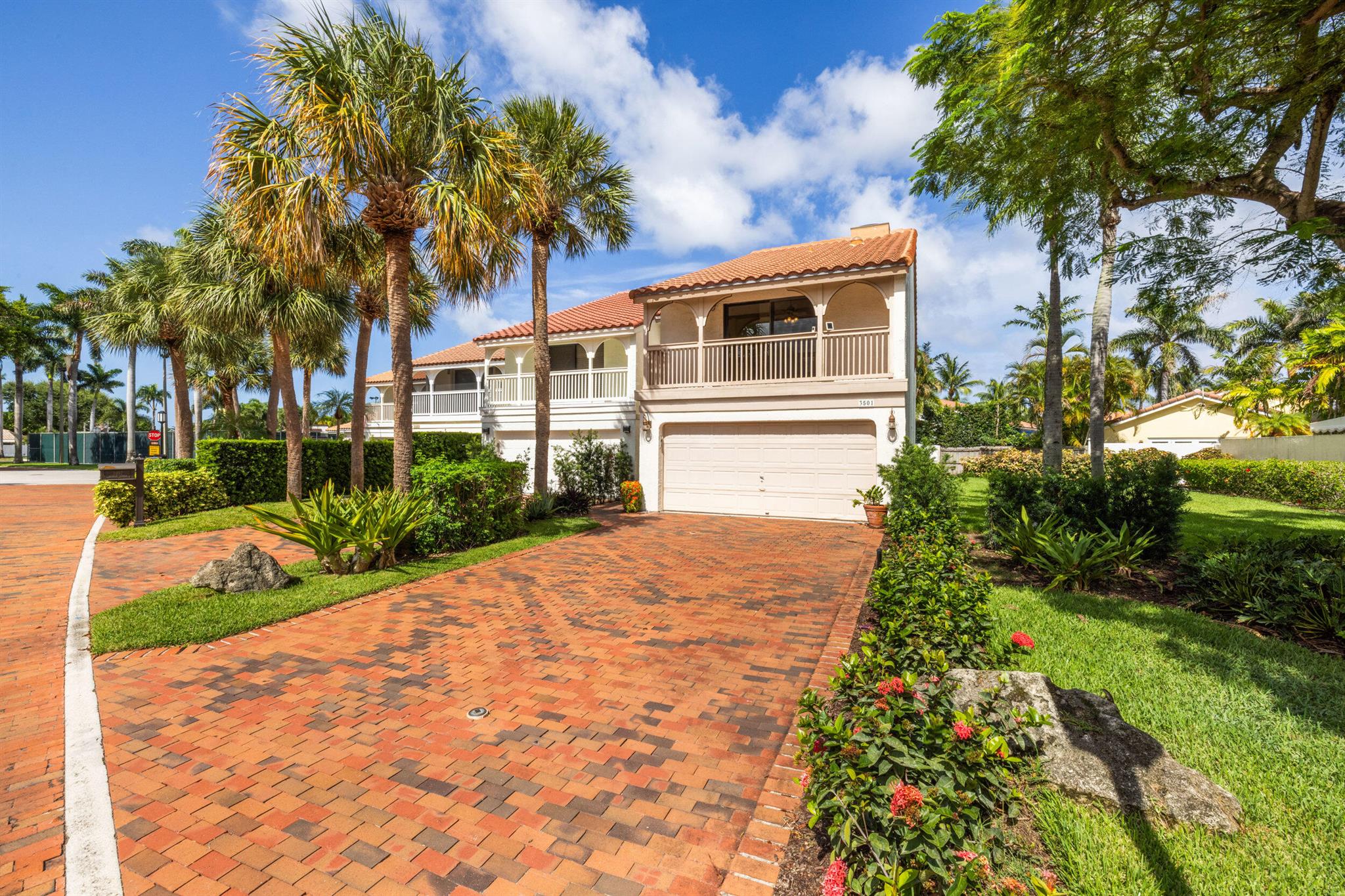A Rare Find in Coastal Luxury Living! Tucked away in the sought-after, guard-gated enclave of Pelican Harbor, this 3-bedroom, 2.5-bath corner-lot townhome offers a lifestyle that blends convenience, security, and resort-style amenities, all just minutes from Delray Beach's vibrant Atlantic Avenue and shoreline. Step inside to find a large, spacious living room, a private screened porch and patio perfect for entertaining or relaxing outdoors, and a 2-car garage for ultimate convenience. Enjoy direct ocean access with docks for rent or purchase just a short stroll away. Pelican Harbor offers a vibrant lifestyle with two resort-style pools, fitness center, tennis/pickleball courts, yacht club, and pet-friendly living. Perfect as a full-time home or luxe getaway. Low HOA, top amenities!