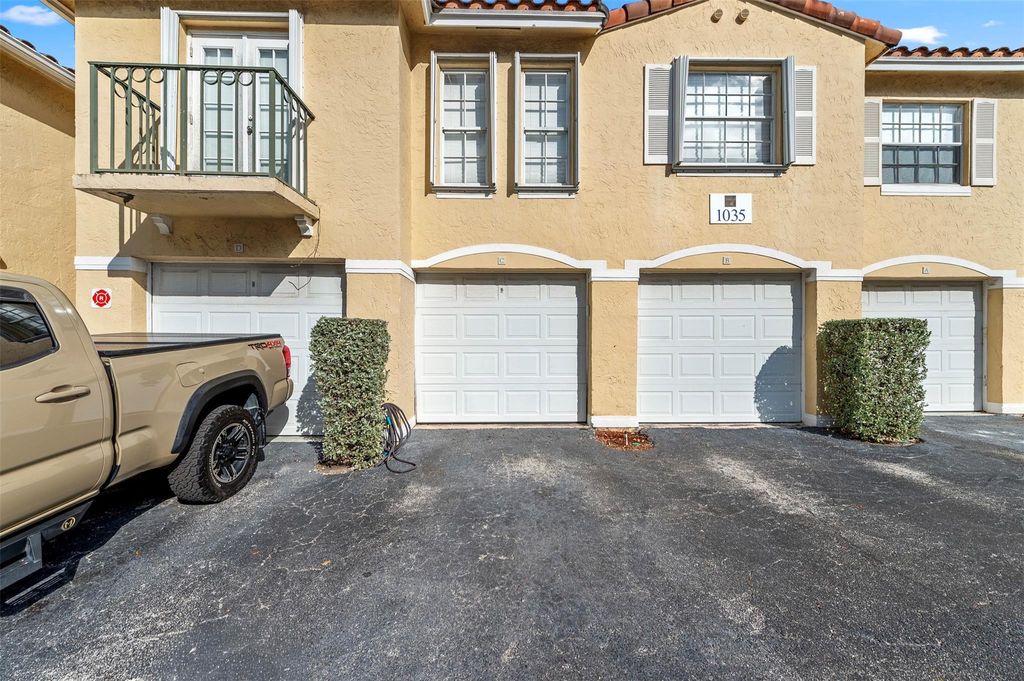 Photo of 1035 Lake Shore Drive #105, Lake Park, FL 33403 (MLS # F10539222)