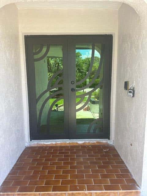 Photo of 14040 Paddock Drive, Wellington, FL 33414 (MLS # B26024996)