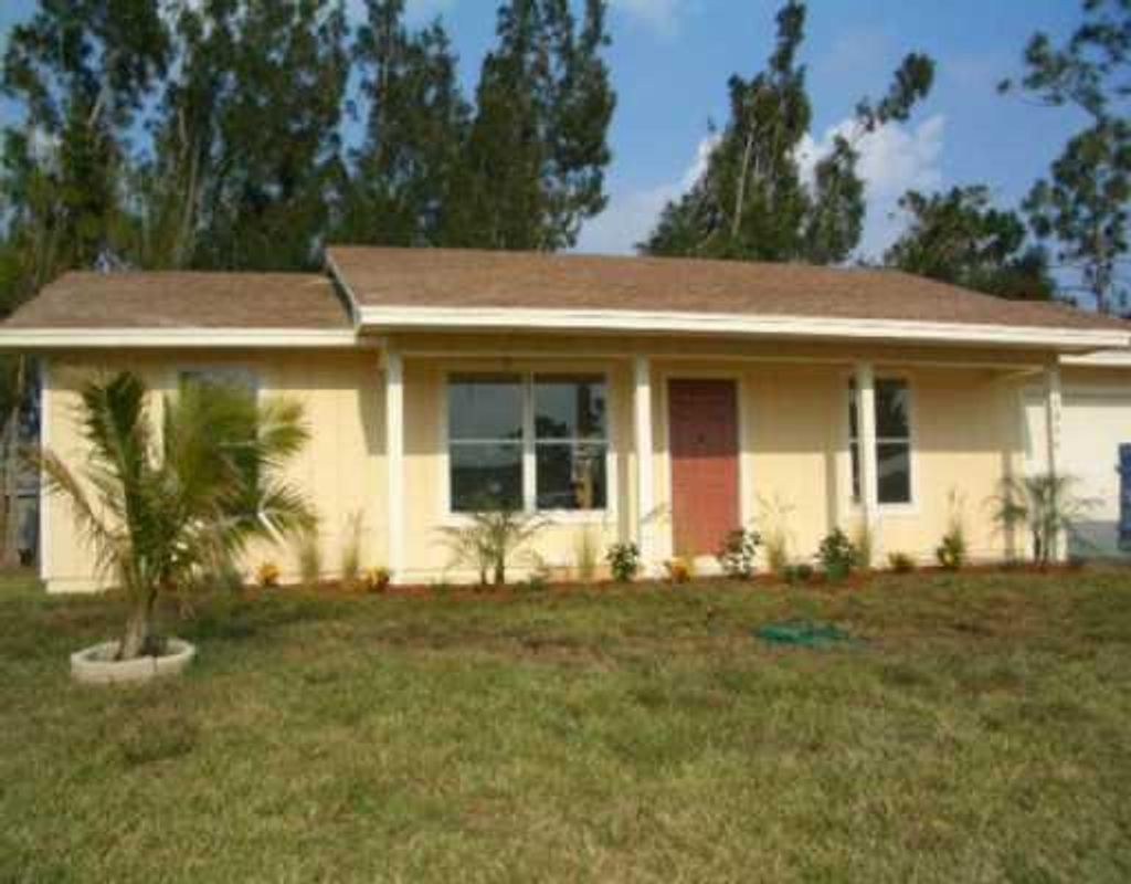 Photo of 1056 SW Fenway Road, Port Saint Lucie, FL 34953 (MLS # R10805398)