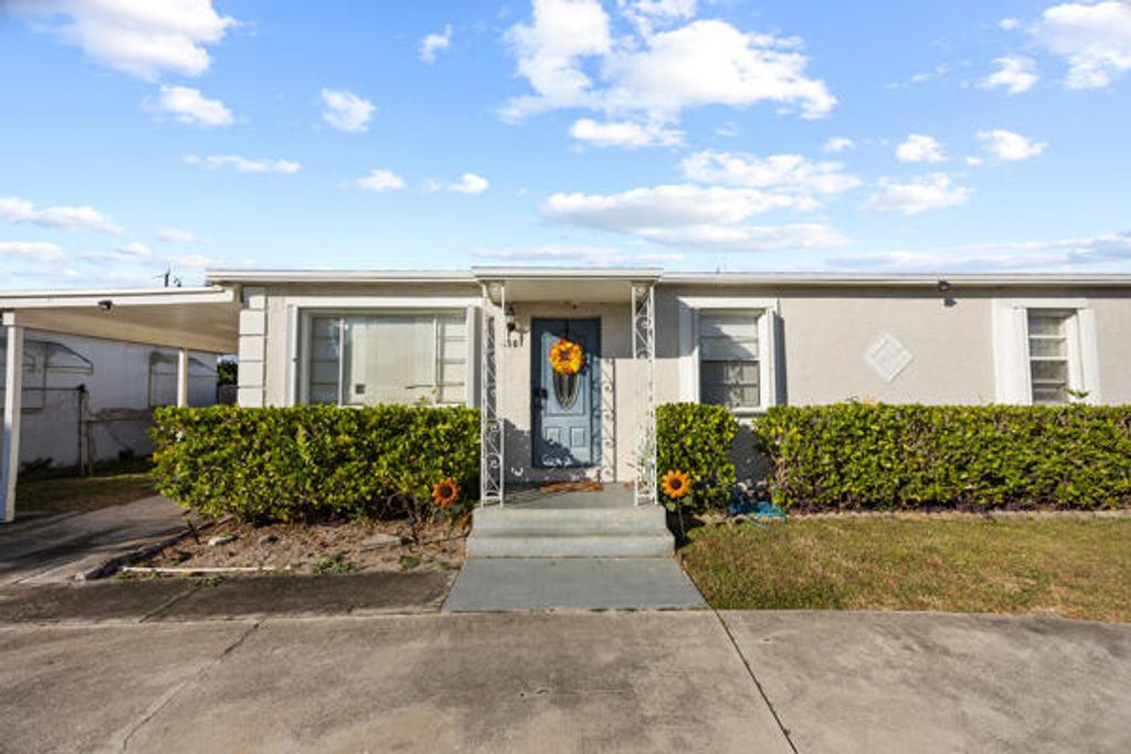 Photo of 430 W 25th Street, Riviera Beach, FL 33404 (MLS # R11141257)