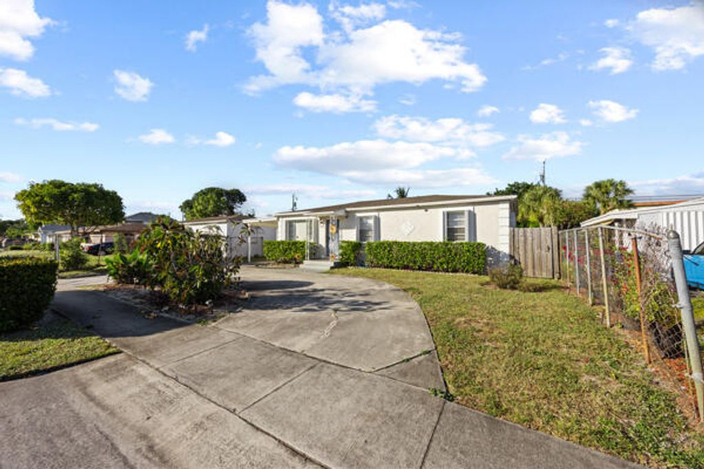 Photo of 430 W 25th Street, Riviera Beach, FL 33404 (MLS # R11141257)