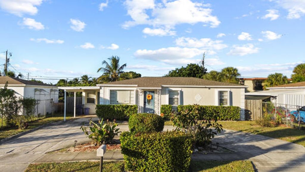 Photo of 430 W 25th Street, Riviera Beach, FL 33404 (MLS # R11141257)