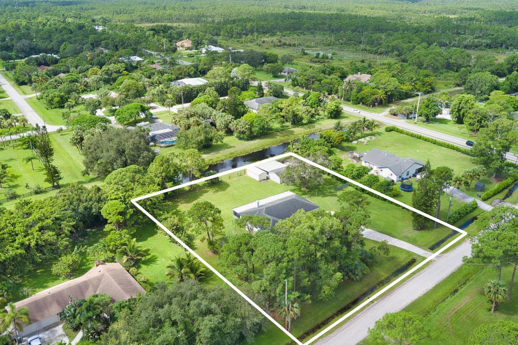 Photo of 6944 150th Place N, Palm Beach Gardens, FL 33418 (MLS # R10914077)