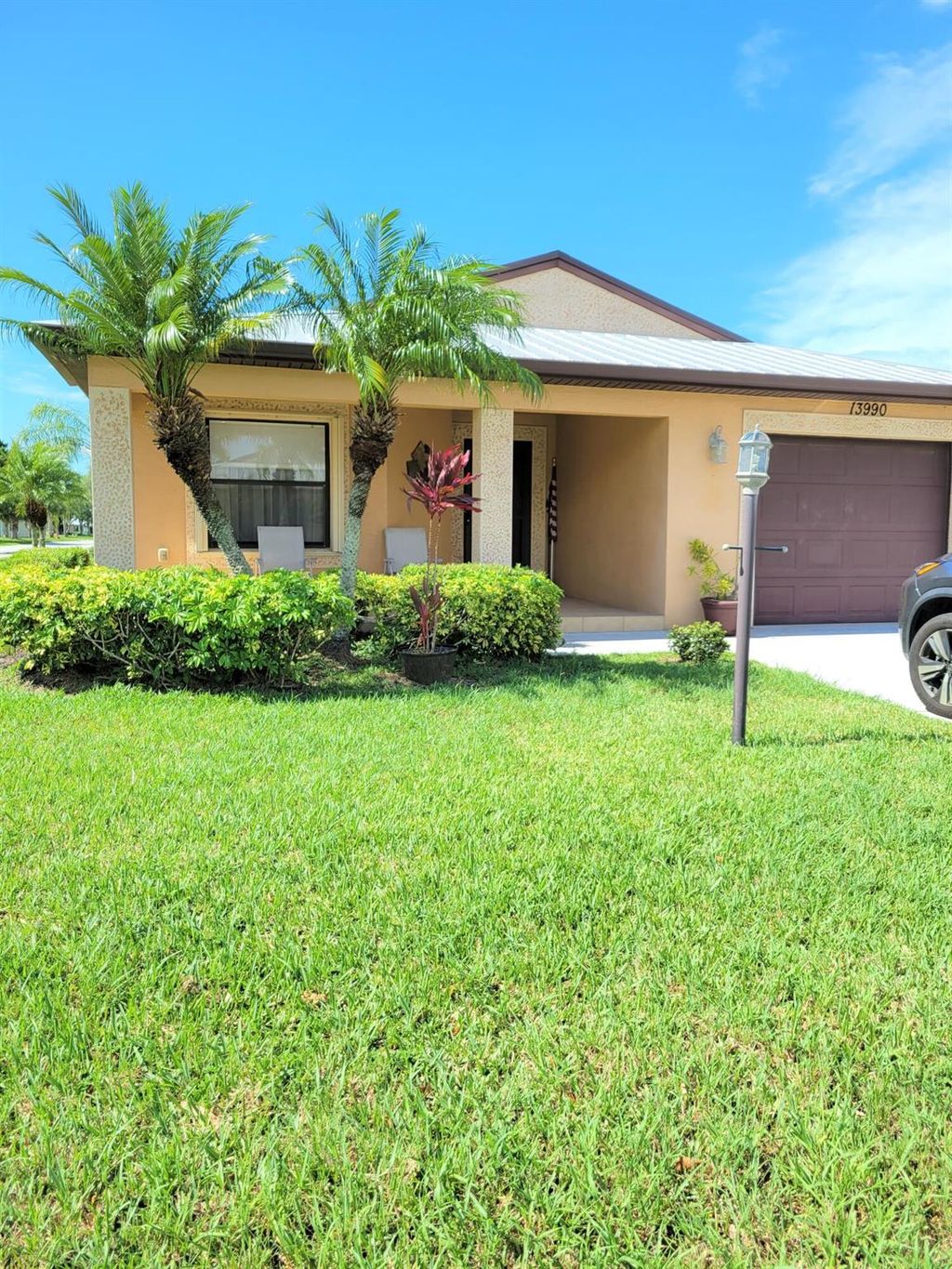 Photo of 13990 Zorzal Ave, Fort Pierce, FL 34951 (MLS # R10898984)