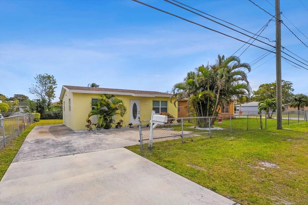 Photo of 1389 Silver Beach Road, Riviera Beach, FL 33404 (MLS # R11003795)