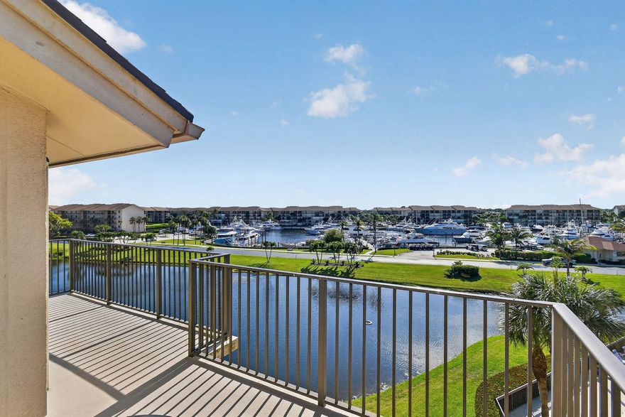 Discover this stunning Bluffs Marina Penthouse, where elegance meets comfort. Beautifully updated, this residence features soaring vaulted ceilings in the living area and both bedrooms, creating a spacious feel that sets it apart from lower-floor units. The gourmet kitchen offers quartz countertops, breakfast bar, and stainless-steel appliances, while luxury vinyl flooring provides style and easy maintenance. A large utility room is perfect for storage, office, or flex space. Enjoy four resort-style pools with covered pavilions and beautiful marina and lake views. Stay active with tennis, pickleball, and bocce ball courts. Lush tropical landscaping, winding sidewalks, and refreshing ocean breezes create the perfect setting for walking, biking, and relaxed coastal living.
