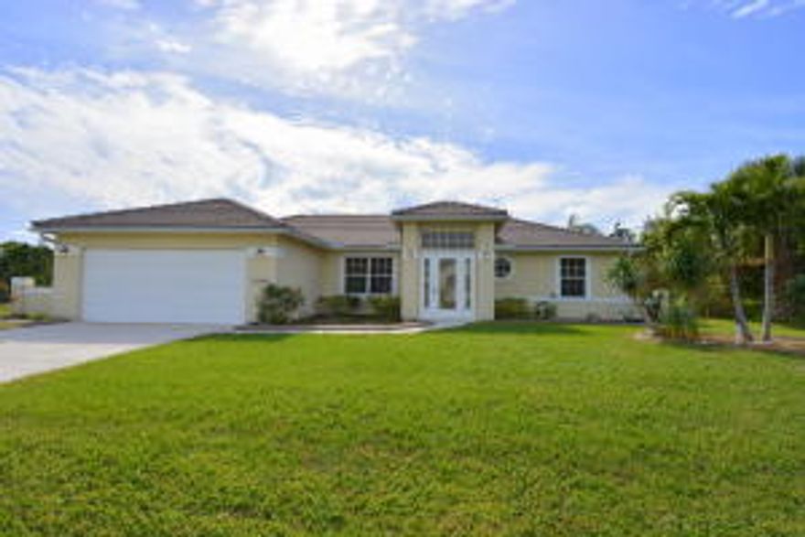 DON'T MISS OUT ON THIS PRIVATE POOL HOME LOCATED EAST OF PORT ST. LUCIE. ENJOY SWIMMING OR RELAXING IN YOUR POOL/SPA WITH A PRIVATE BACKYARD. THIS 3/2/2 POOL HOME LOCATED CLOSE TO BEACHES, MALL, AND RESTAURANTS WON'T LAST LONG. CALL TODAY FOR A PRIVATE SHOWING!