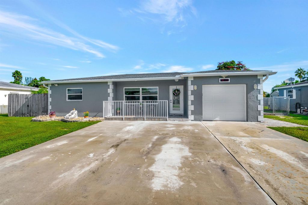 Photo of 4613 Betelnut Street, Boca Raton, FL 33428 (MLS # R11014445)