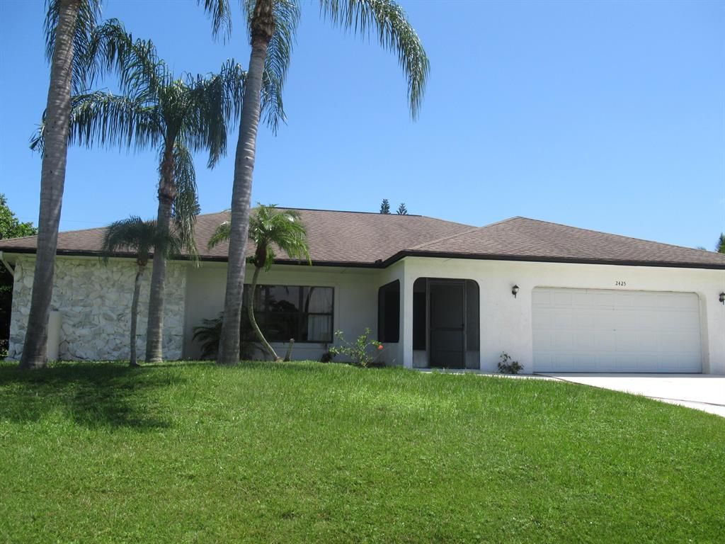 Photo of 2425 SE Marius Street, Port Saint Lucie, FL 34952 (MLS # R10742062)