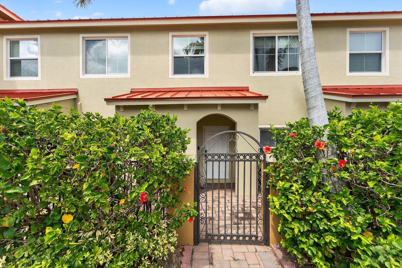 Outstanding opportunity to live in a great townhome with IMPACT WINDOWS, NEW LAMINATE FLRS ON STAIRS & 2ND LEVEL (no carpets!) & a BRAND NEW ROOf in this lovely gated community! Located just 8 min from the shopping, dining & vibrant nighlife of Delray Beach, and less than 15 min to beautiful beaches, and so much more. Perfect floor plan with laundry & 1/2 bath on 1st floor, and 2 spacious upstairs bedrooms, each with its OWN private bath. Designated parking right in front of home. Monterey Bay is a beautiful gated, community, featuring a pool and playground. Great place to call home!