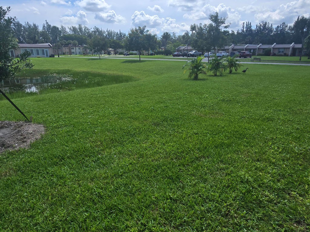 Photo of 135 LAKE MERYL Drive, West Palm Beach, FL 33411 (MLS # B26076609)