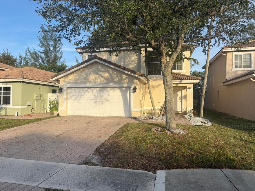 Great opportunity to own this spacious 3 bedroom/ 2 1/2 bath home located in suburban West Palm Beach. Large kitchen with formal dining room, 3 bedrooms upstairs with Jack & Jill bedrooms sharing a bathroom as well as larger main bedroom with spacious bathroom. Dual his & hers sinks, separate shower, spa tub & walk-in closet. Laundry upstairs and large 2 car garage downstairs. Nice backyard for kids playing area or add an outdoor patio. Gated community close to all shopping. Must see!