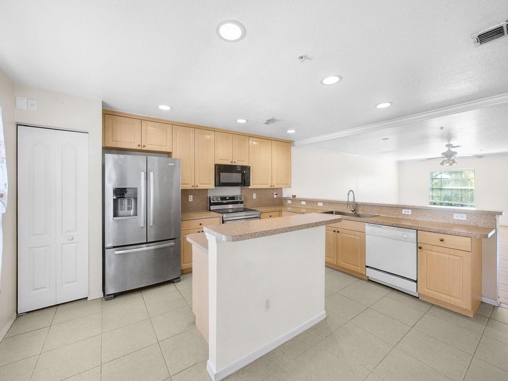 Photo of 1898 SE Interlachen Drive, Port Saint Lucie, FL 34952 (MLS # R11090916)