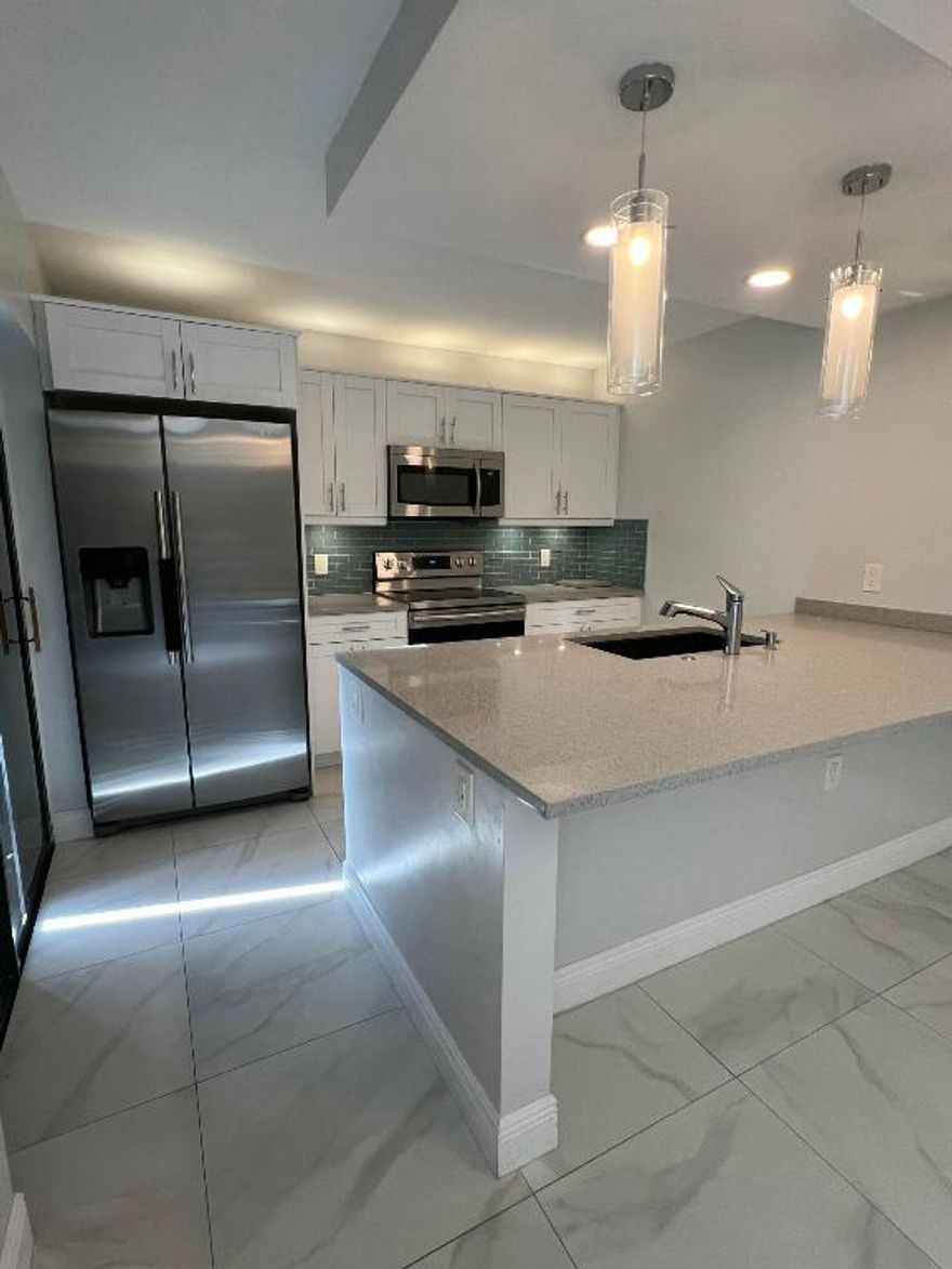 This beautifully remodeled townhome features a brand-new kitchen and all three fully updated bathrooms, and it's truly move-in ready! The main level offers a full bedroom and bathroom ideal for guests or added convenience. Enjoy your own private patio, perfect for relaxing or entertaining.

You won't be disappointed, this one will not last long!

HOA rush processing available in as little as 7 days for an additional $150, or 30 days standard processing.