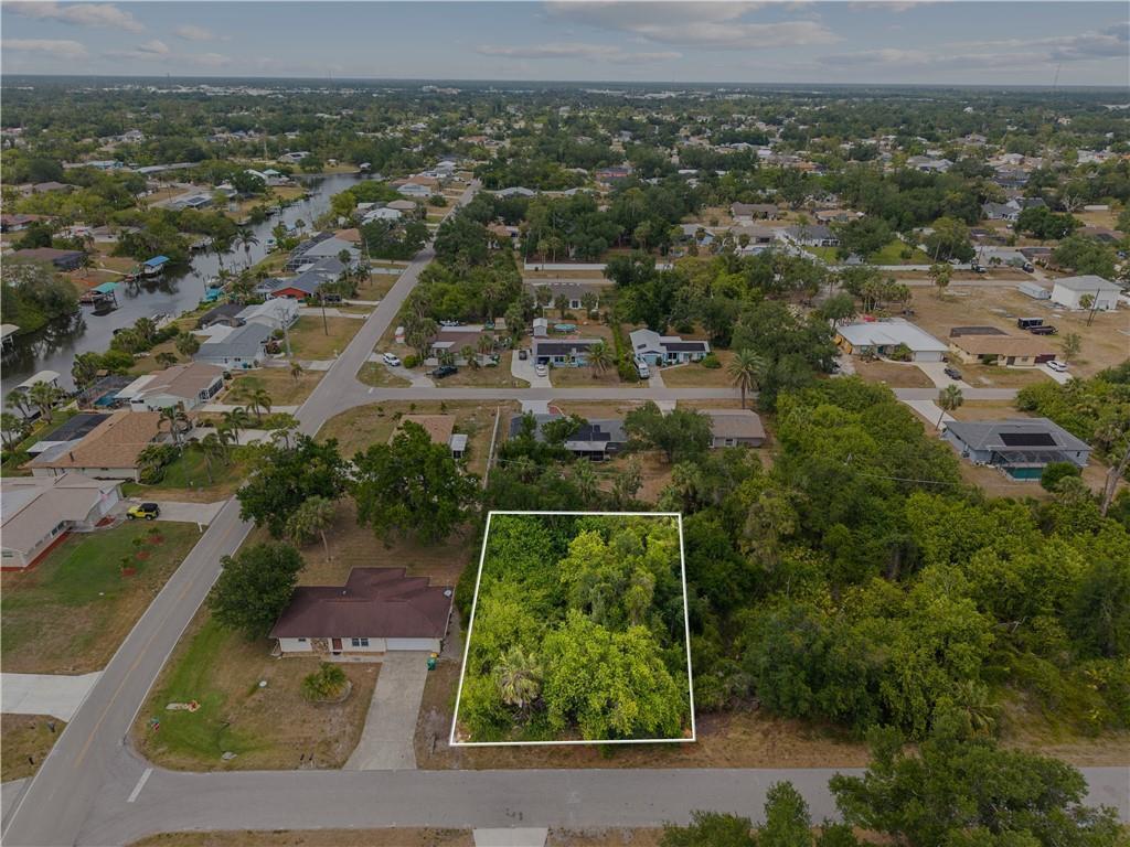 Build your dream home on this exceptional lot in the heart of Port Charlotte, FL! This generously sized property provides ample space for a pool, RV, or boat, and is conveniently located near boat ramps, Larry Taylor Kiwanis Park, golf courses, shopping, and dining. Enjoy the freedom of no HOA restrictions and peace of mind knowing it's outside the flood zone. Don't miss this opportunity to own your slice of Florida paradise.