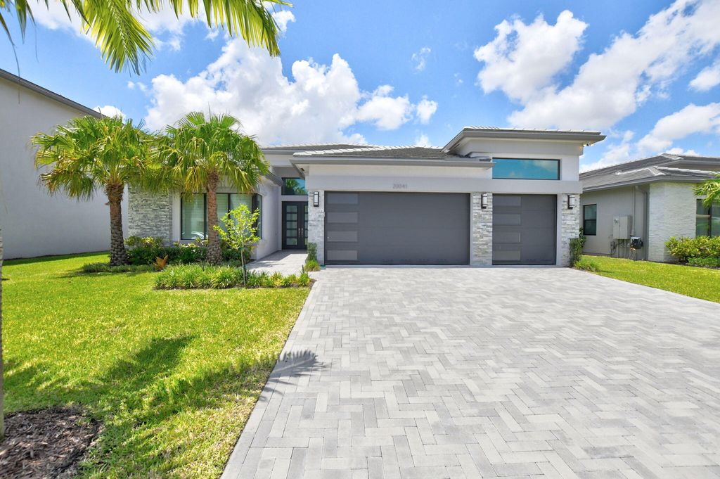 Photo of 20041 Pacific Dunes Drive, Boca Raton, FL 33434 (MLS # B26030066)