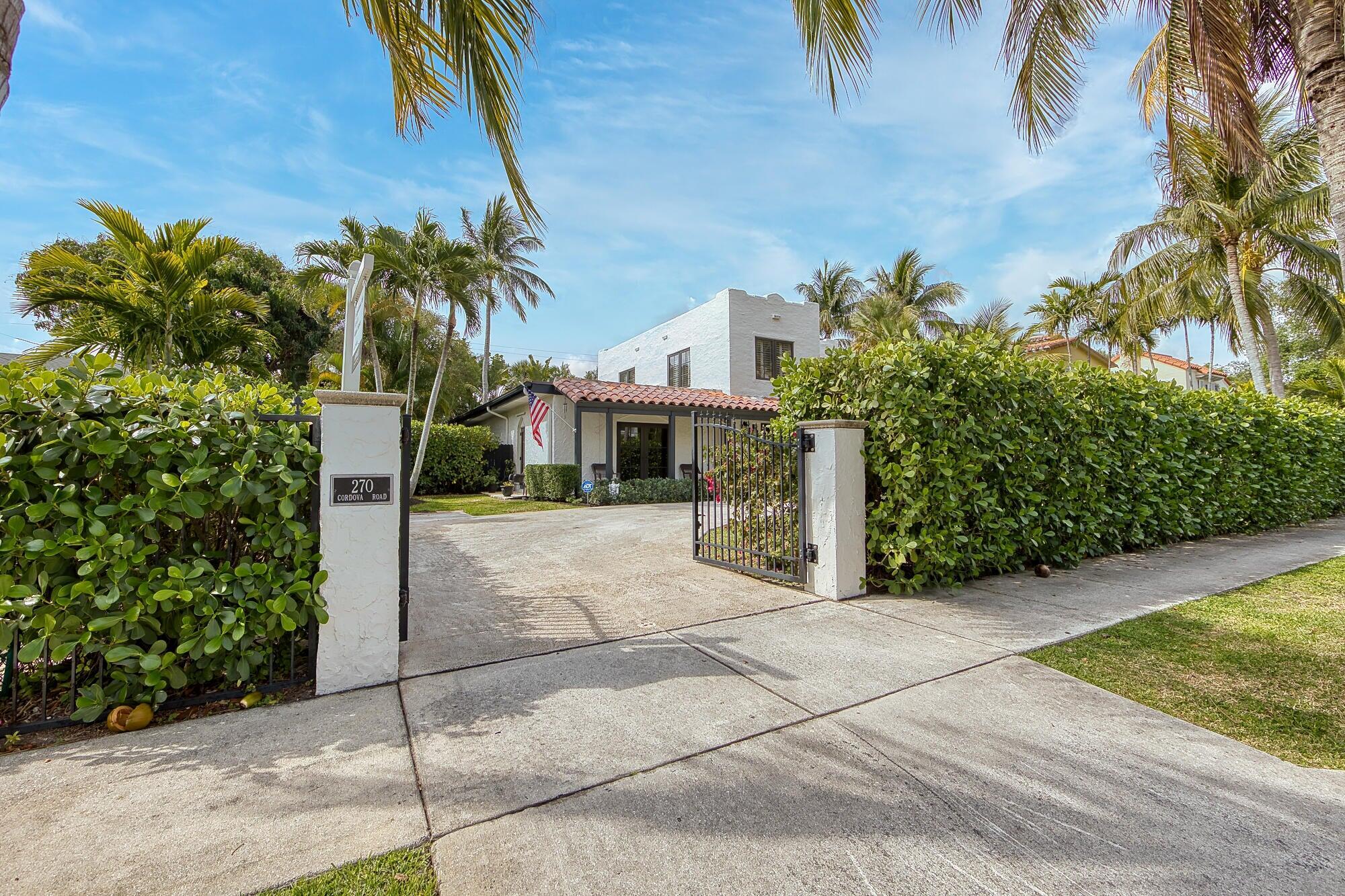 Located in the heart of historic El Cid, only steps to the intracoastal with Palm Beach views from the front lawn/entryway, a Mediterranean style residence with large lot and gardens. Located just south of downtown West Palm. Private and gated, heated pool, cabana/studio & full bath, new impact windows in 2025, new first floor flat roof in 2025. Grand entry foyer, formal dining room, and living room with 14' high tray ceiling and fireplace. Library with french doors, pecky cypress ceiling, and built in bookcases. Spacious first floor primary bedroom w/ en-suite bath, Roman tub, walk in shower, private commode, and large walk in closet. Galley kitchen w/ breakfast room and butler pantry. Family room with french doors leading out to pool deck. Only a 5 minute drive to Palm Beach!