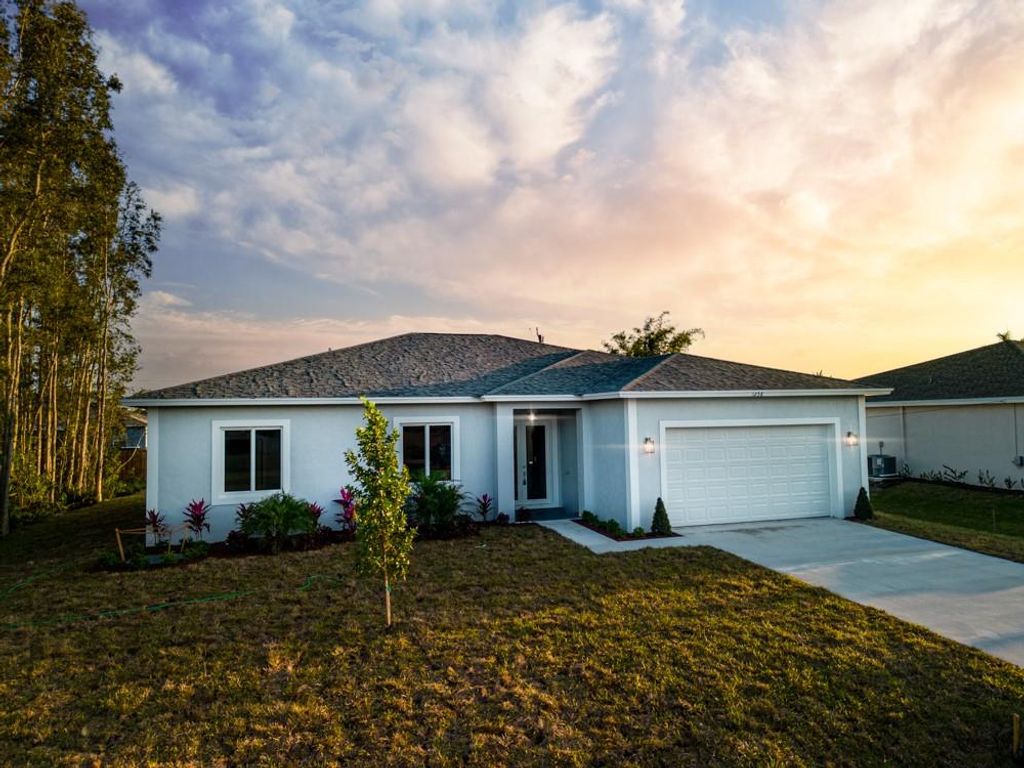 Photo of 4462 SW Attlee St, Port Saint Lucie, FL 34953 (MLS # F10371351)