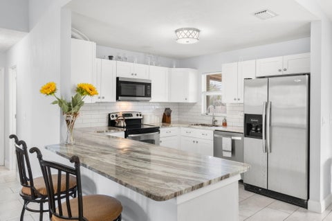 Tiny photo for 1098 SW Janette Avenue, Port Saint Lucie, FL 34953 (MLS # B26090458)
