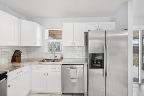 Tiny photo for 1098 SW Janette Avenue, Port Saint Lucie, FL 34953 (MLS # B26090458)