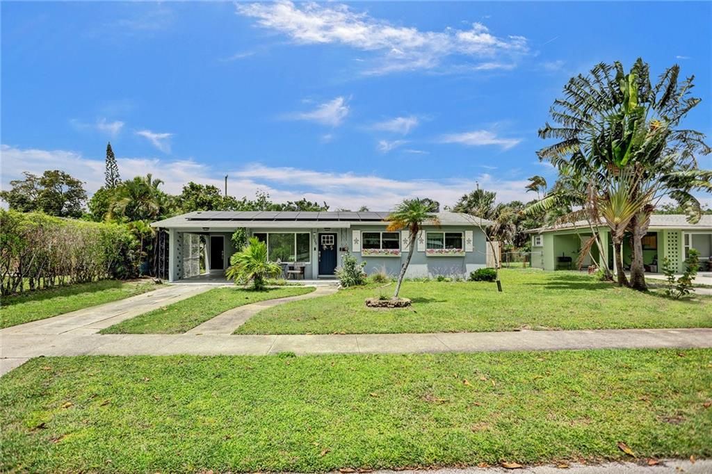 Photo of 725 Date Palm Dr, Lake Park, FL 33403 (MLS # F10378406)